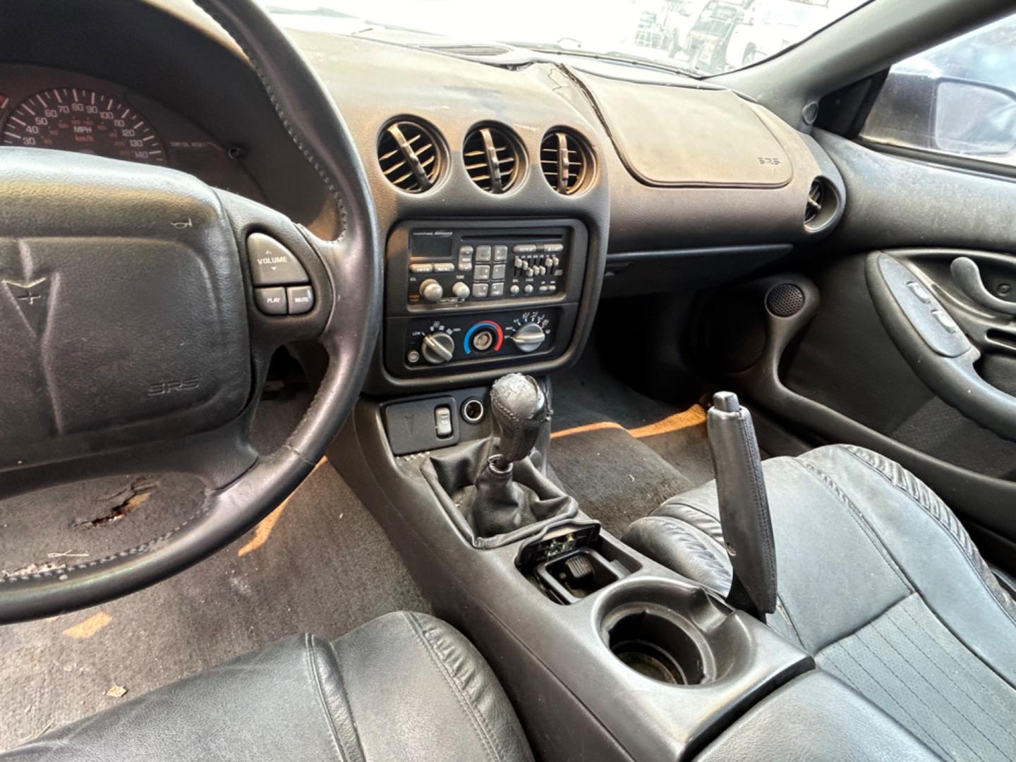 2002 Black Pontiac Firebird Formula Coupe (2G2FV22G522) with an 5.7L V8 OHV 16V engine, located at 1687 Business 35 S, New Braunfels, TX, 78130, (830) 625-7159, 29.655487, -98.051491 - Photo#10